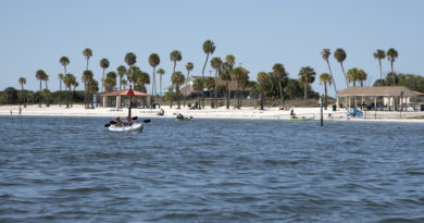 Kayakers on the shore of MacDill AFB