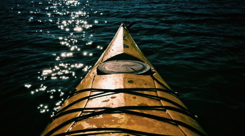 Kayak on water Photo by Josh Duncan on Unsplash